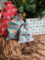 Load image into Gallery viewer, Western Christmas Reusable Gift Bag - Green Longhorns/Ponies
