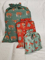 Load image into Gallery viewer, Western Christmas Reusable Gift Bags - Red Ponies Print
