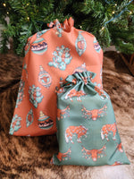 Load image into Gallery viewer, Western Christmas Reusable Gift Bags - Burnt Orange Ornaments
