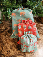 Load image into Gallery viewer, Western Christmas Reusable Gift Bag - Green Longhorns/Ponies
