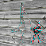 Load image into Gallery viewer, Turquoise, pink, and black yearling size four-knot rope halter.
