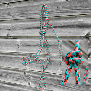 Turquoise, pink, and black yearling size four-knot rope halter.