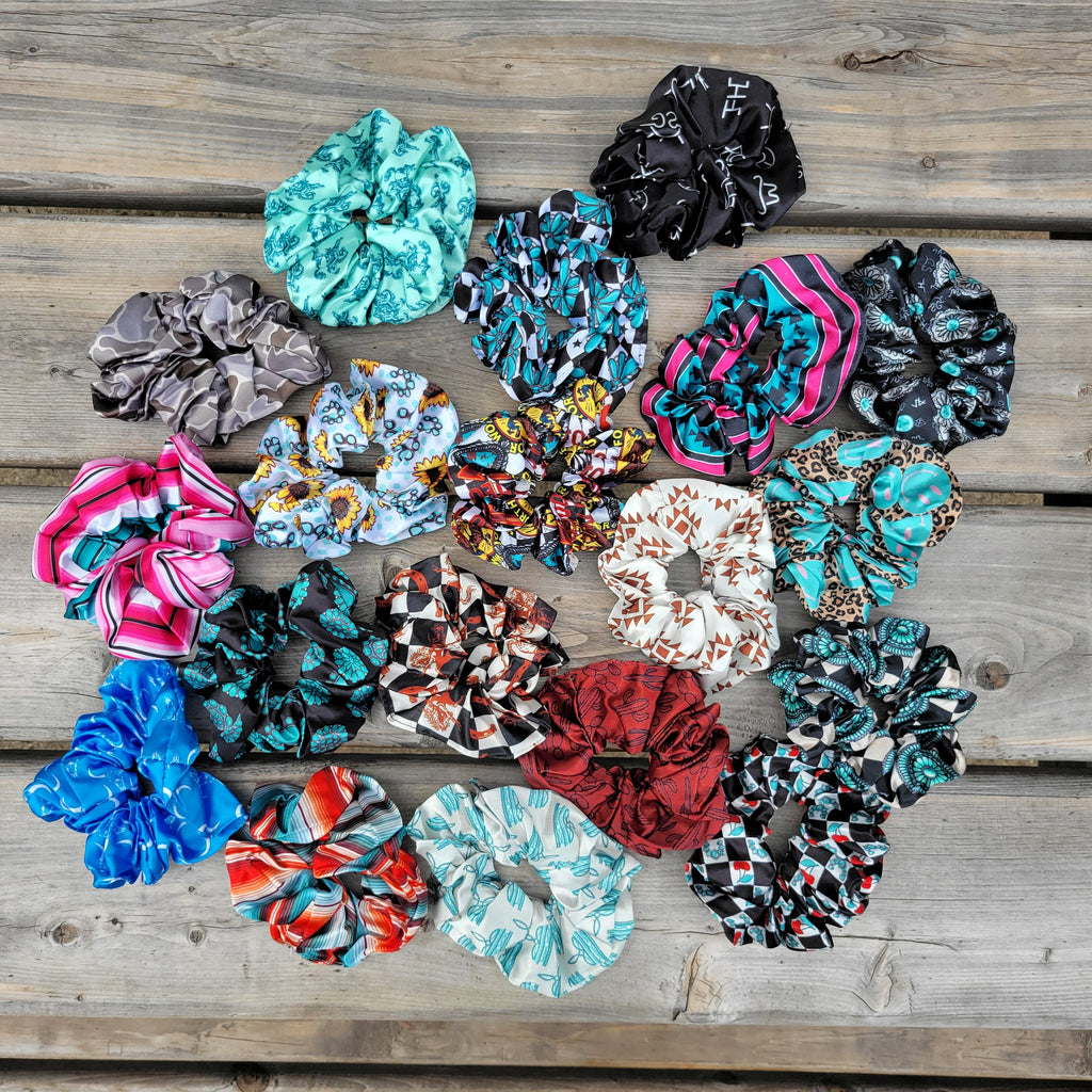 Collection of colorful western themed scrunchies.