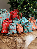 Load image into Gallery viewer, Western Christmas Reusable Gift Bags - Red Ponies Print
