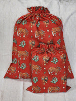 Load image into Gallery viewer, Western Christmas Reusable Gift Bags - Red Ponies Print
